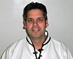 Dan Ferrera teaching in 2004, wearing a white traditional uniform, during the period he served as senior instructor under Katsumi Niikura Sensei